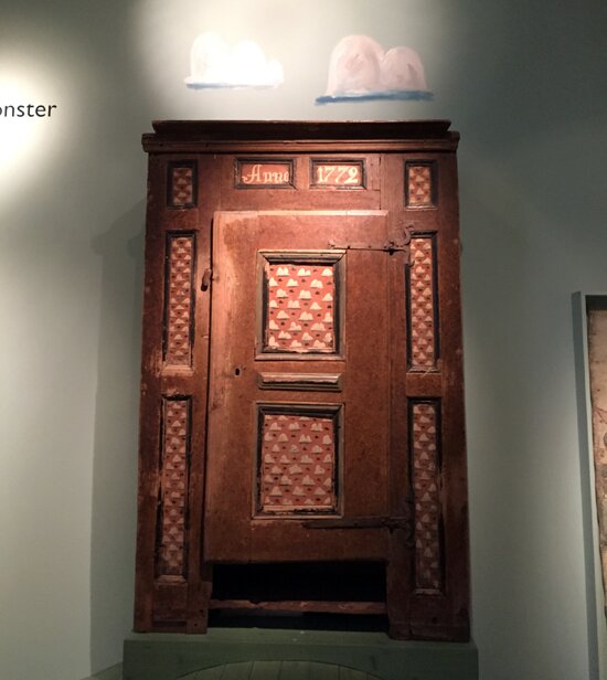 Cupboard decorated with clouds Nordiskamuseet